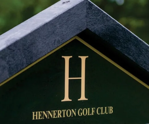 The crest of Hennerton Golf Club on its JB Golf tee sign