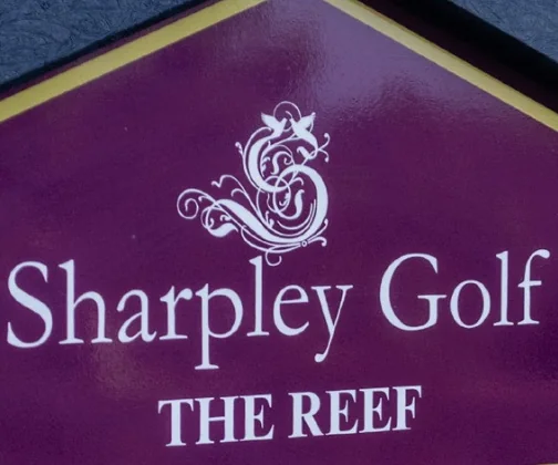 The crest of Sharpley Golf Club on its JB Golf tee sign