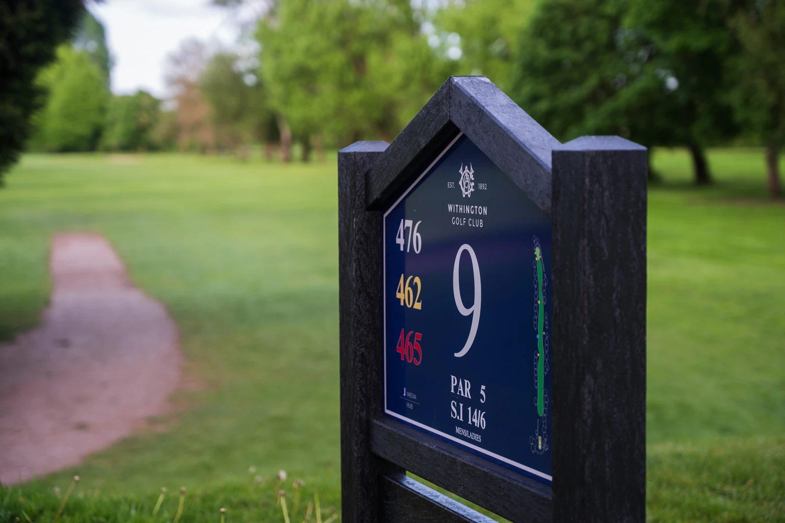 Close-up of the tee sign at Withington Golf Club