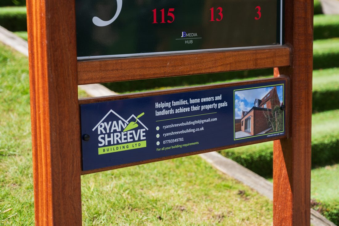 Ryan Shreeve Building’s panel on a JB tee sign